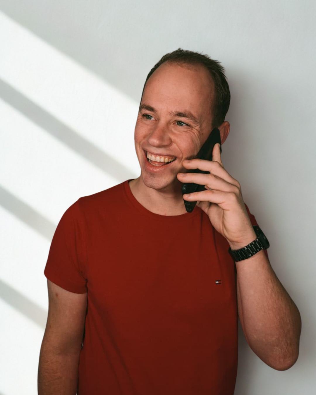 Sander aan de telefoon